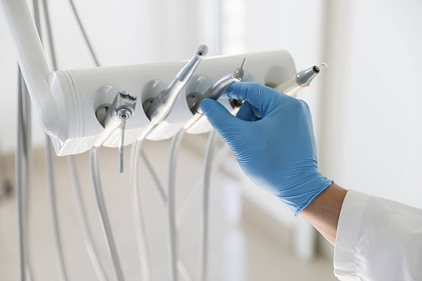 Professional Tooth Extraction technician working in Durand, MI
